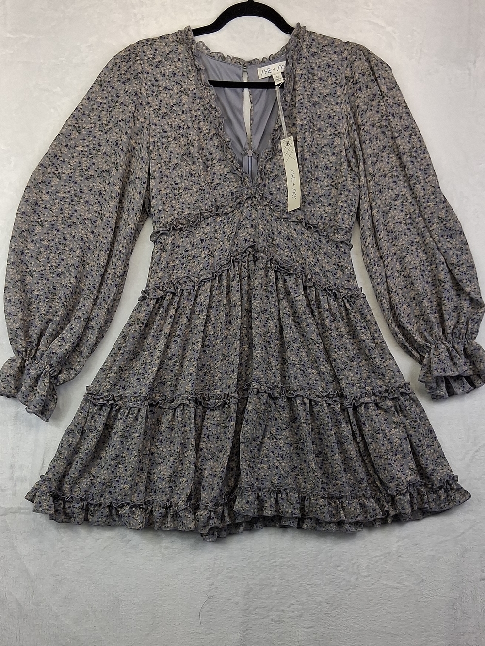 She+Sky Smocked Tiered Floral Mini Dress in Lavender Purple